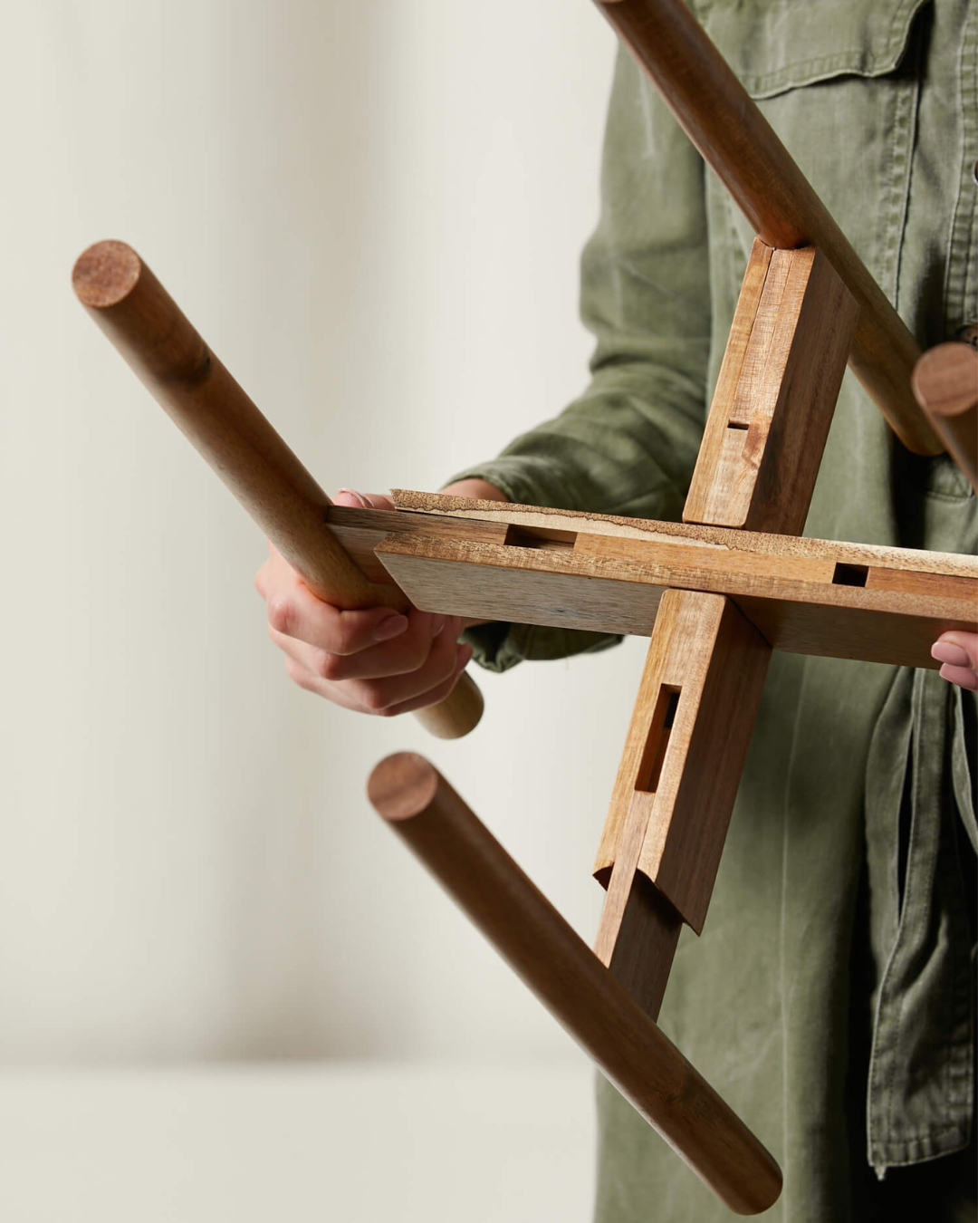 underside of adjustable plant stand