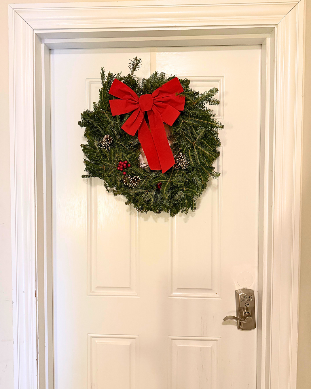 fraser fir wreath on door
